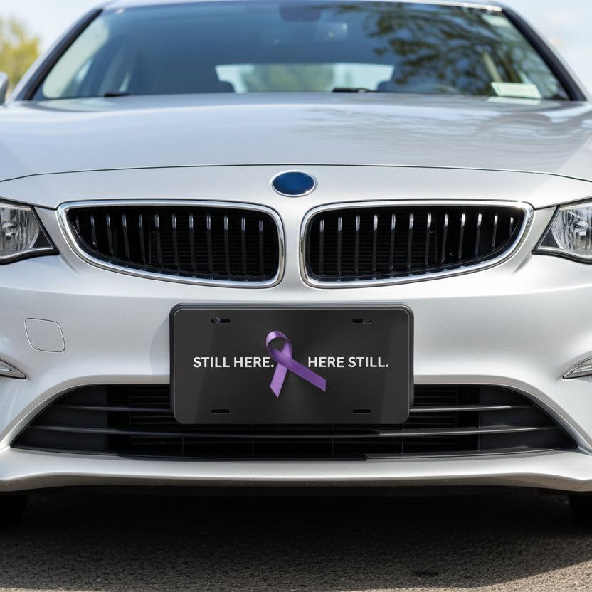 “Still Here. Here Still.” Epilepsy Awareness Vanity Plate – Purple Ribbon
