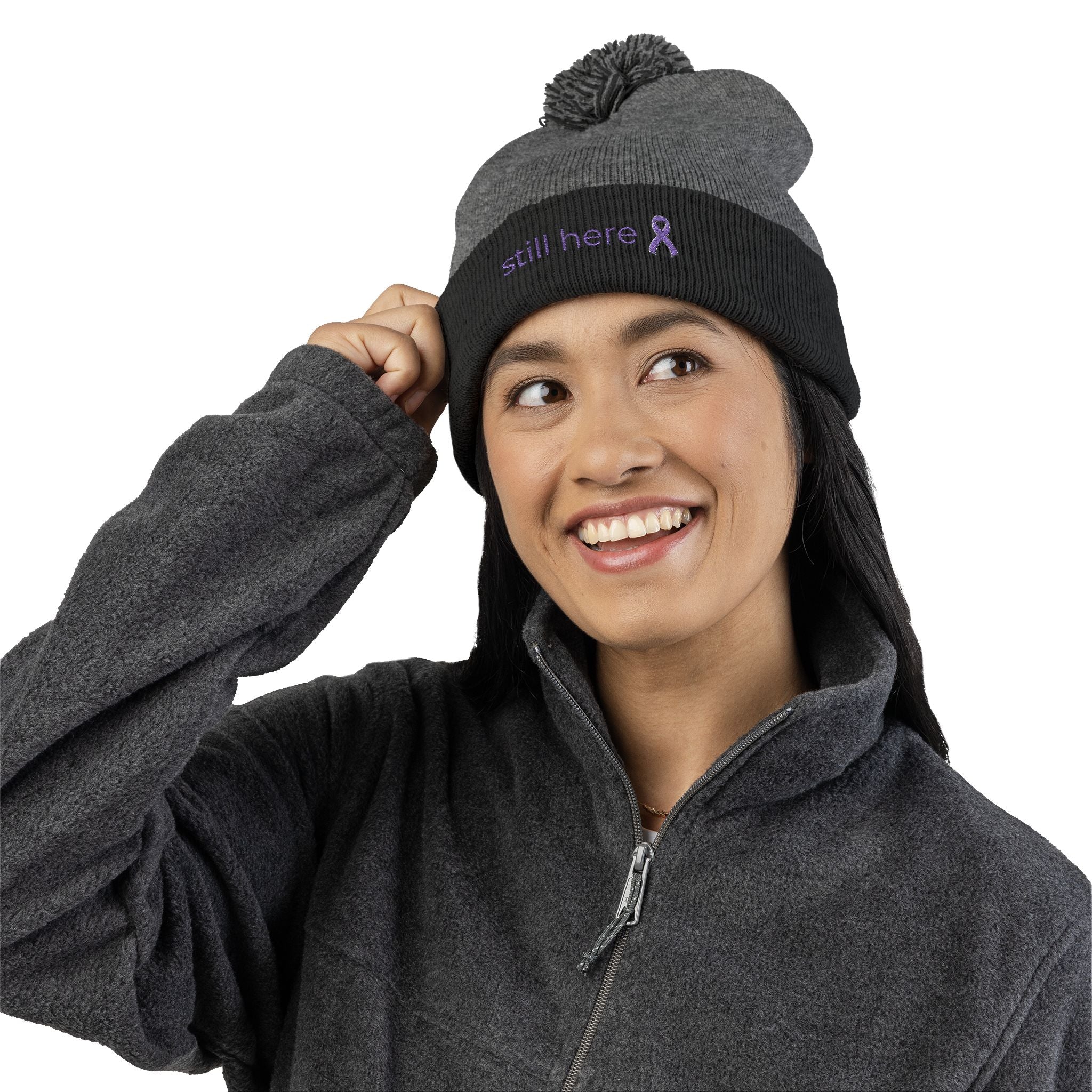 Still Here Pom-Pom Beanie – Epilepsy Awareness Knit Hat with Purple Ribbon