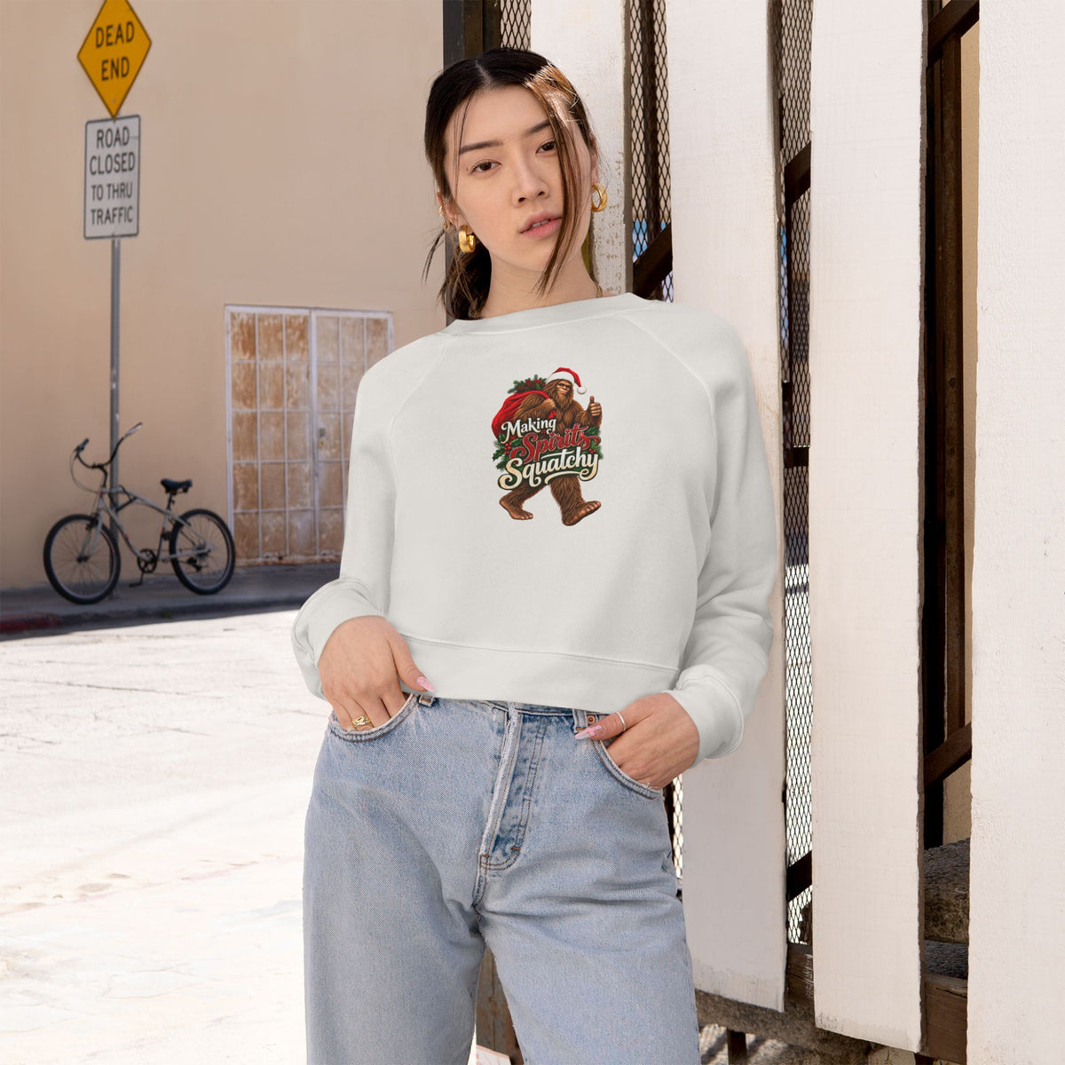 Making Spirits Squatchy Women's Cropped Christmas Sweatshirt | Santa Bigfoot Fleece Pullover