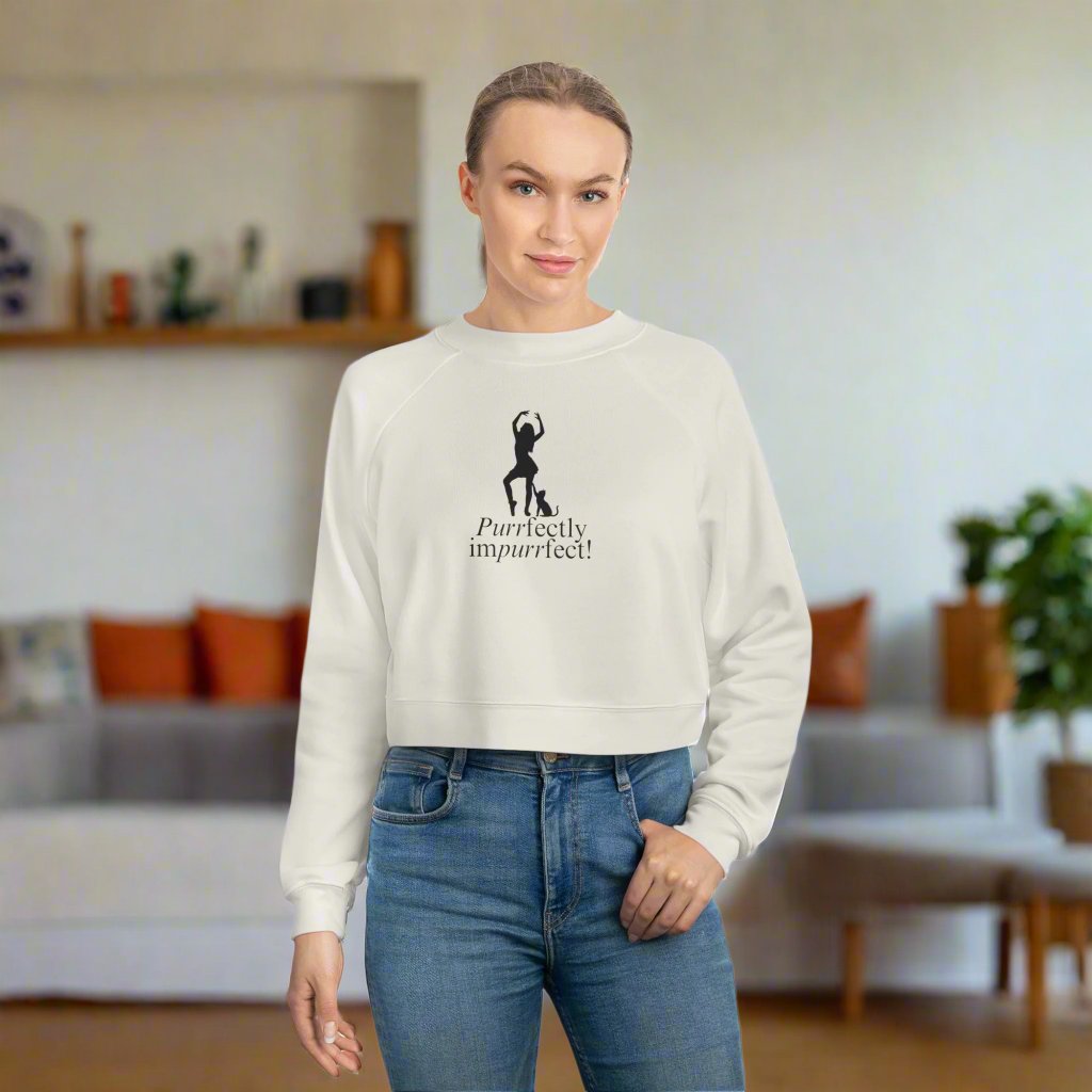 Photo depicting the ​Purrfectly Impurrfect Women's Cropped Fleece Pullover from EpiAl's Shop.