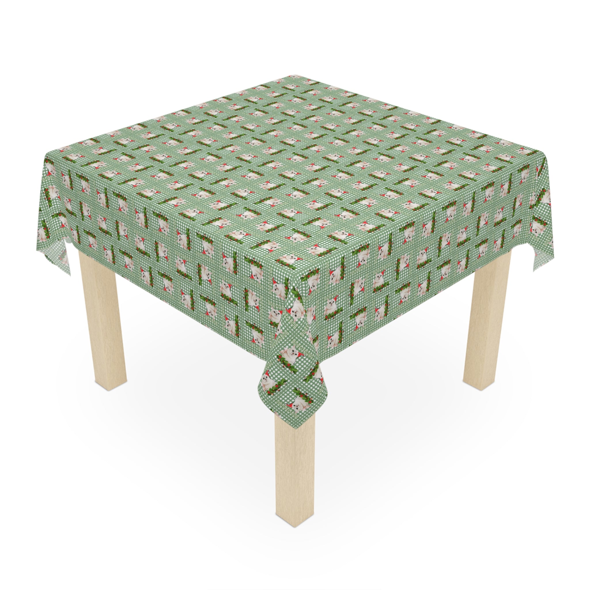 Photo depicting the ​Meowy Gingham Christmas Tablecloth from EpiAl's Shop.