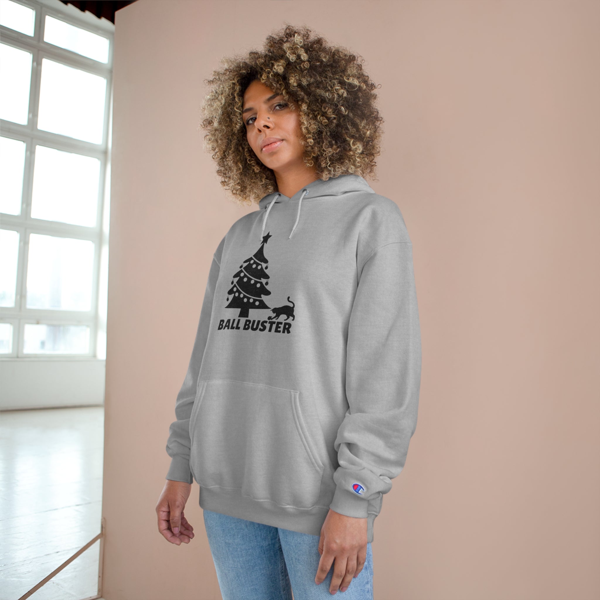 Photo depicting the ​Christmas Ball Buster Champion Hoodie from EpiAl's Shop.