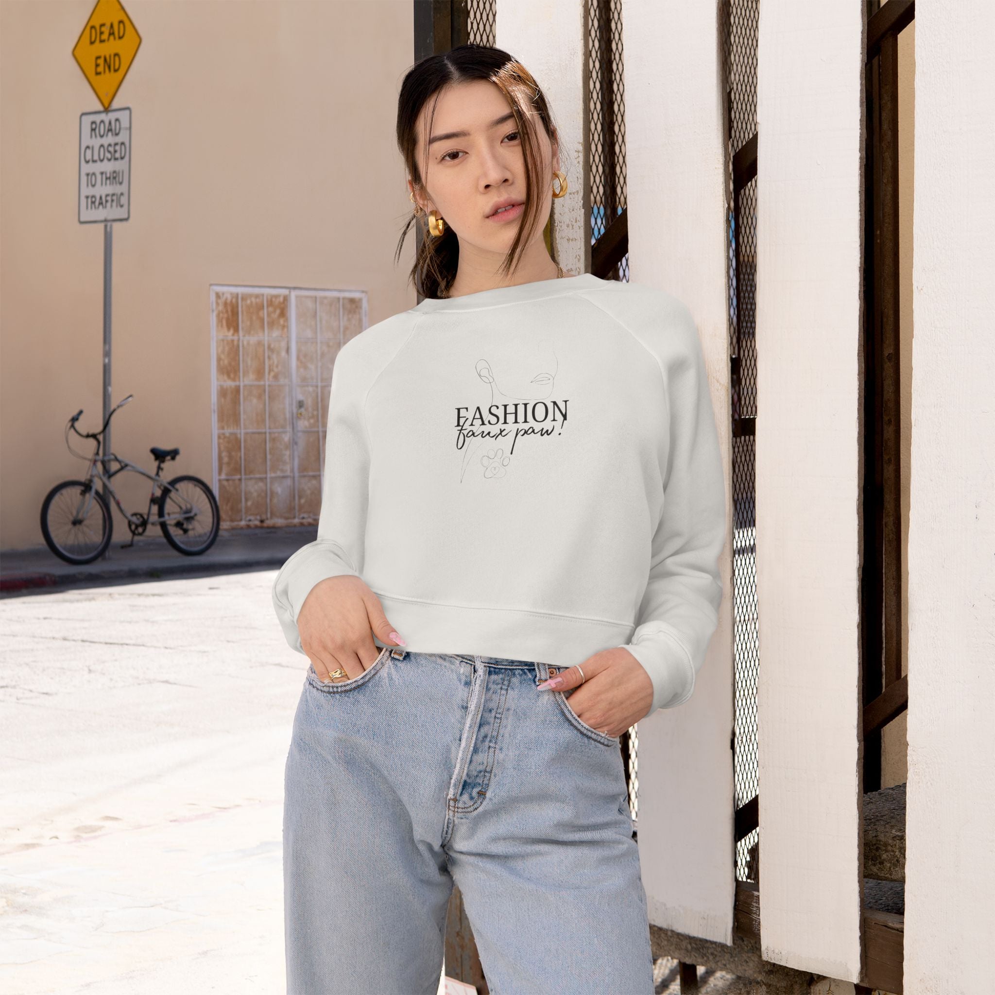Photo depicting the ​Fashion Faux Paw Women's Cropped Fleece Pullover from EpiAl's Shop.