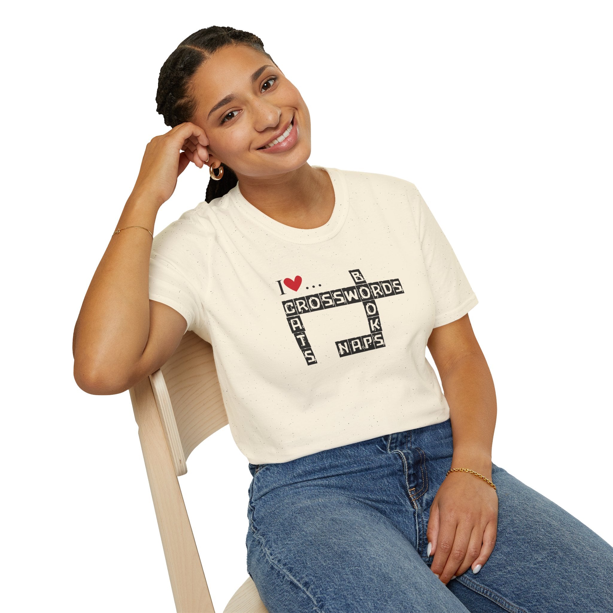 Photo depicting the ​Crosswords and Cats Unisex Softstyle T-Shirt from EpiAl's Shop.