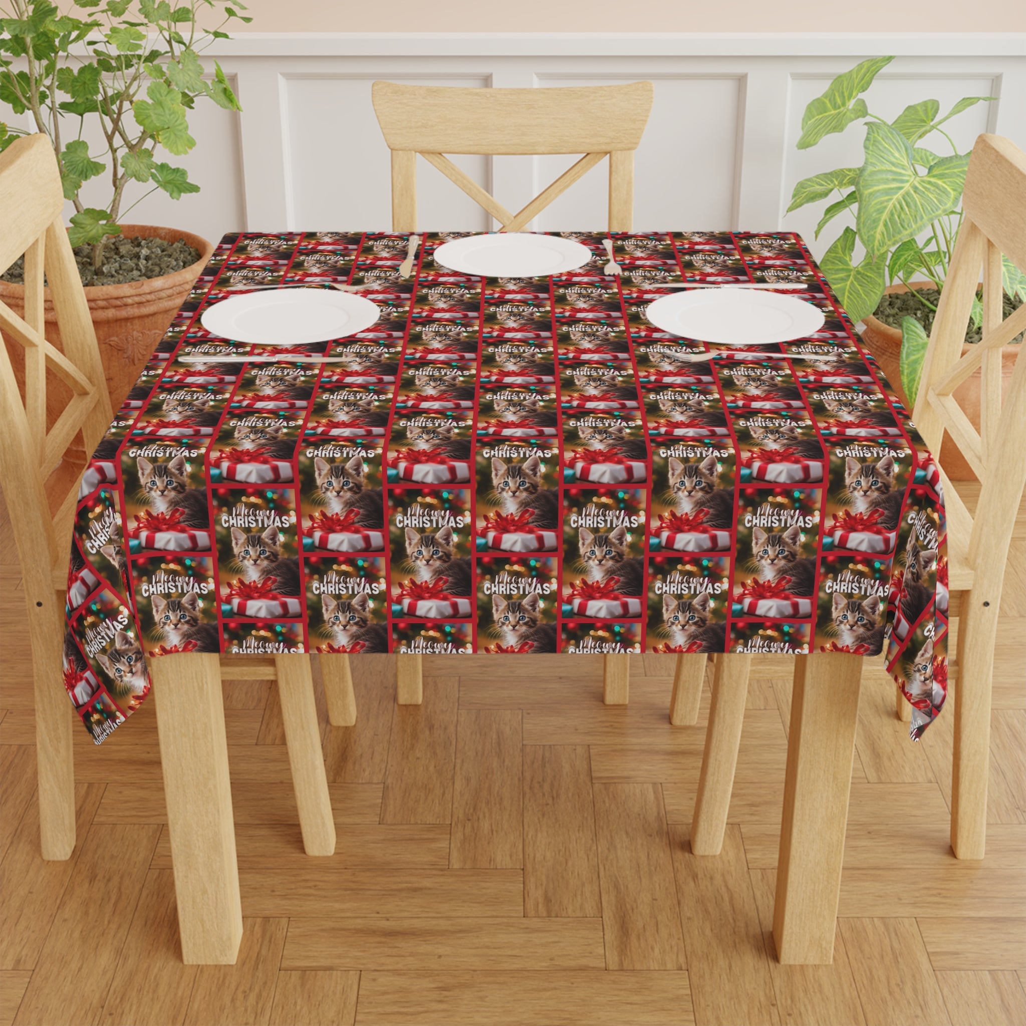 Photo depicting the ​Meowy Christmas Tablecloth from EpiAl's Shop.