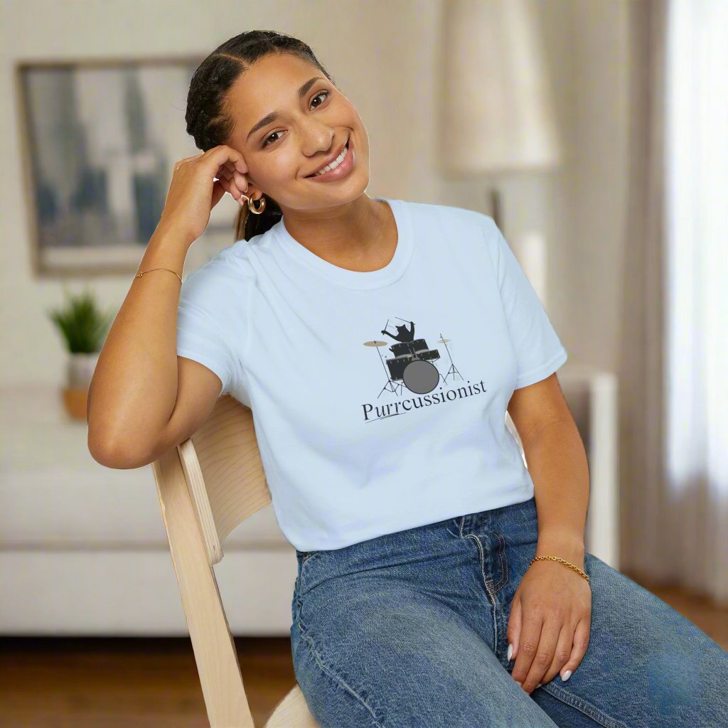 Photo depicting the ​Purrcussionist Unisex Softstyle T-Shirt from EpiAl's Shop.