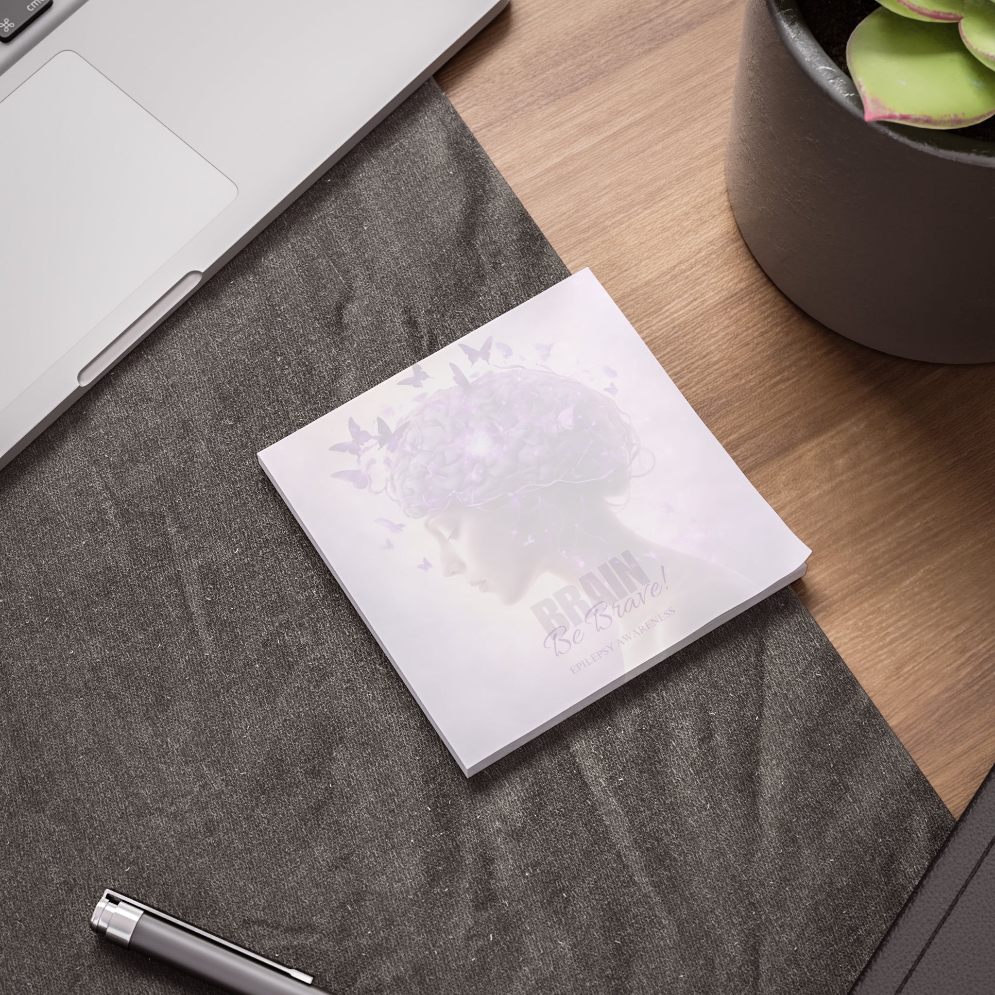 Photo depicting the ​Beautiful Brain Epilepsy Awareness Post-it® Note Pads from EpiAl's Shop.