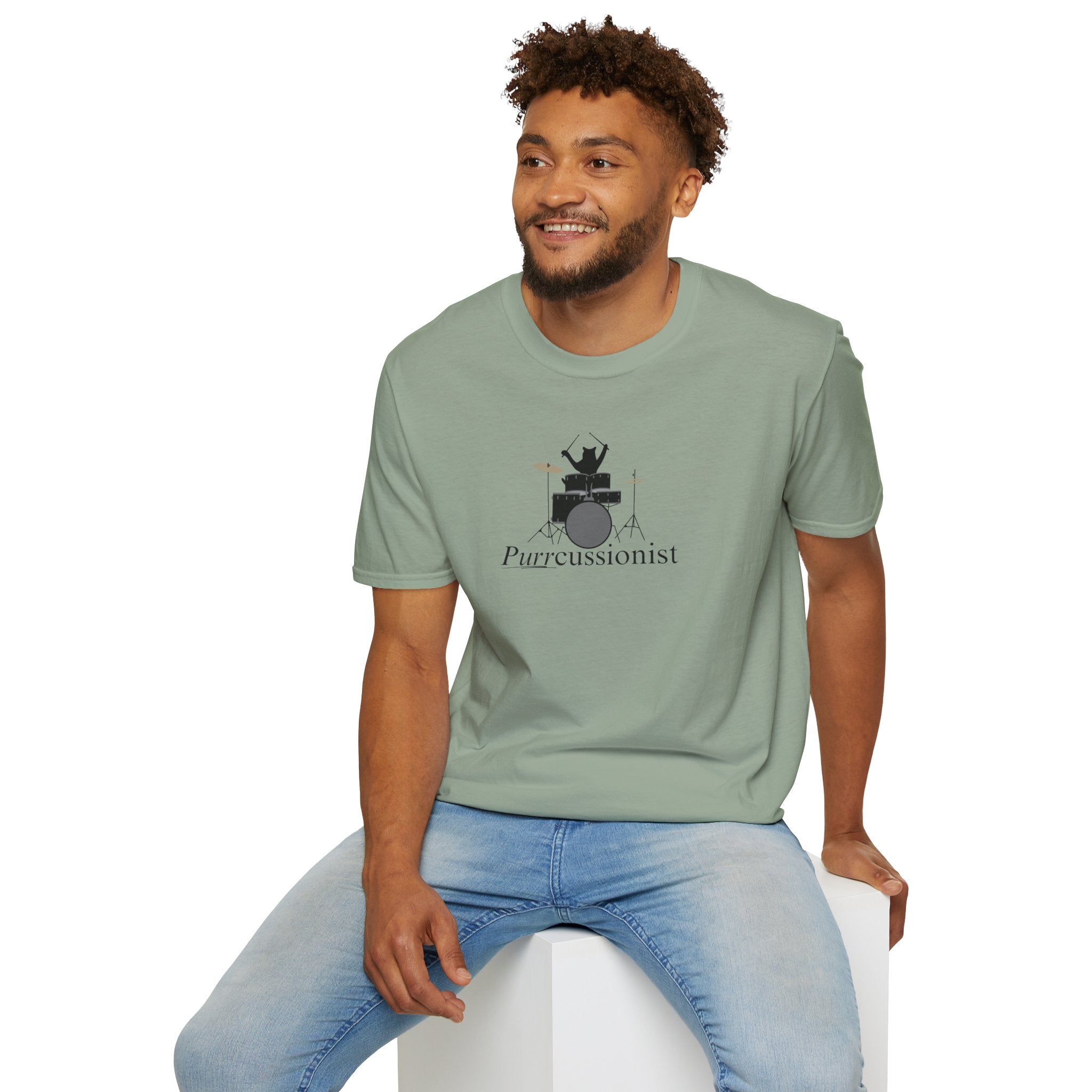 Photo depicting the ​Purrcussionist Unisex Softstyle T-Shirt from EpiAl's Shop.