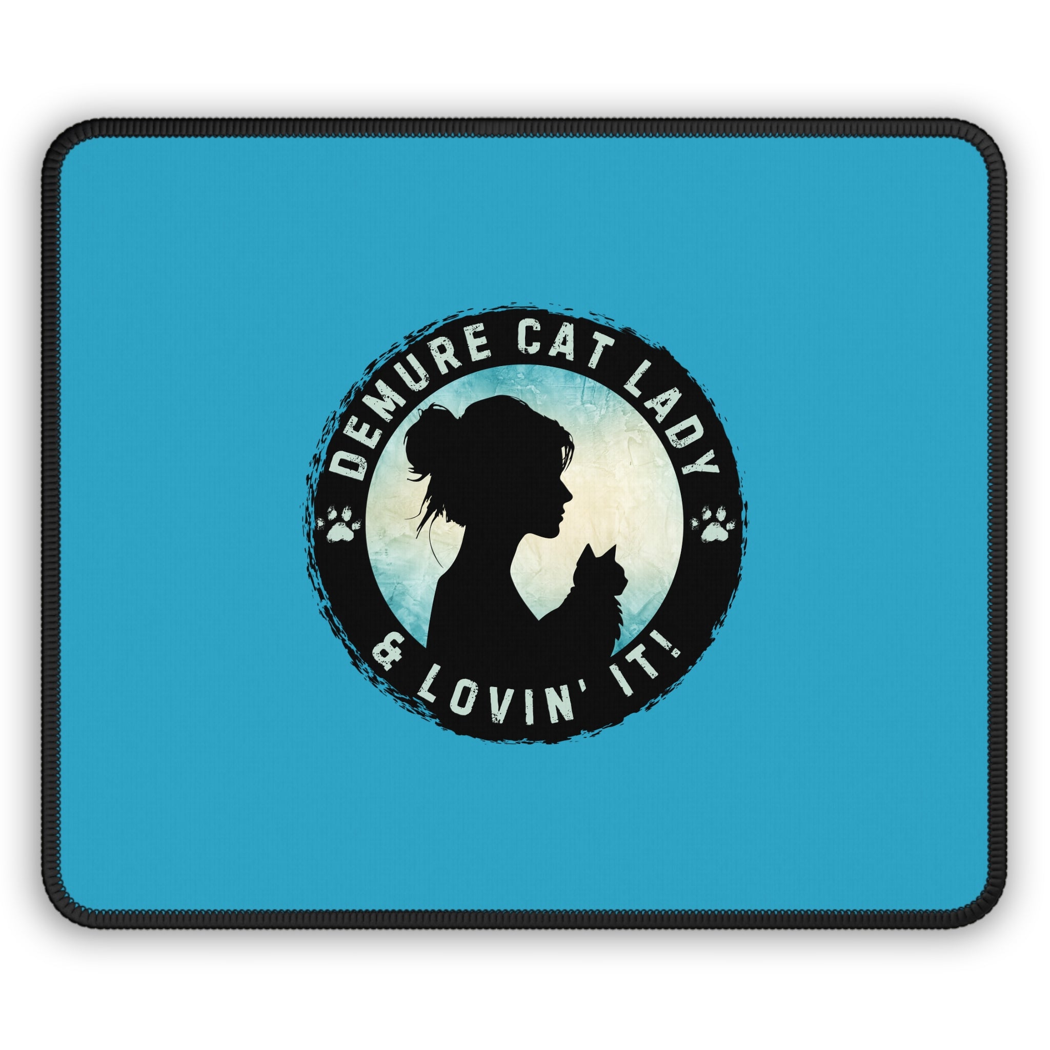 Photo depicting the ​Demure Cat Lady Gaming Mouse Pad from EpiAl's Shop.