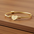 Still Here – Braided Heart Cuff Bracelet