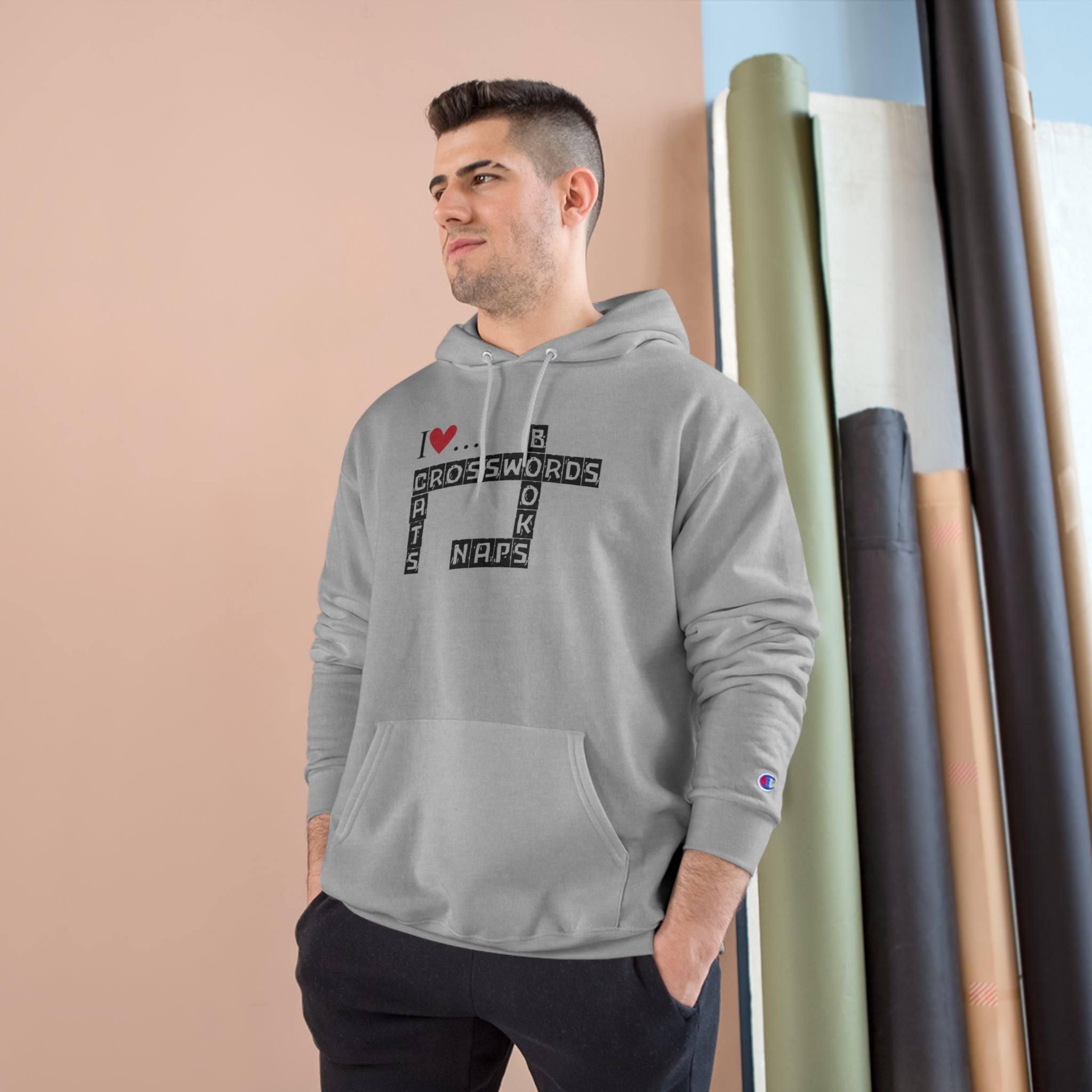 Photo depicting the ​Crosswords and Cats Champion Hoodie from EpiAl's Shop.