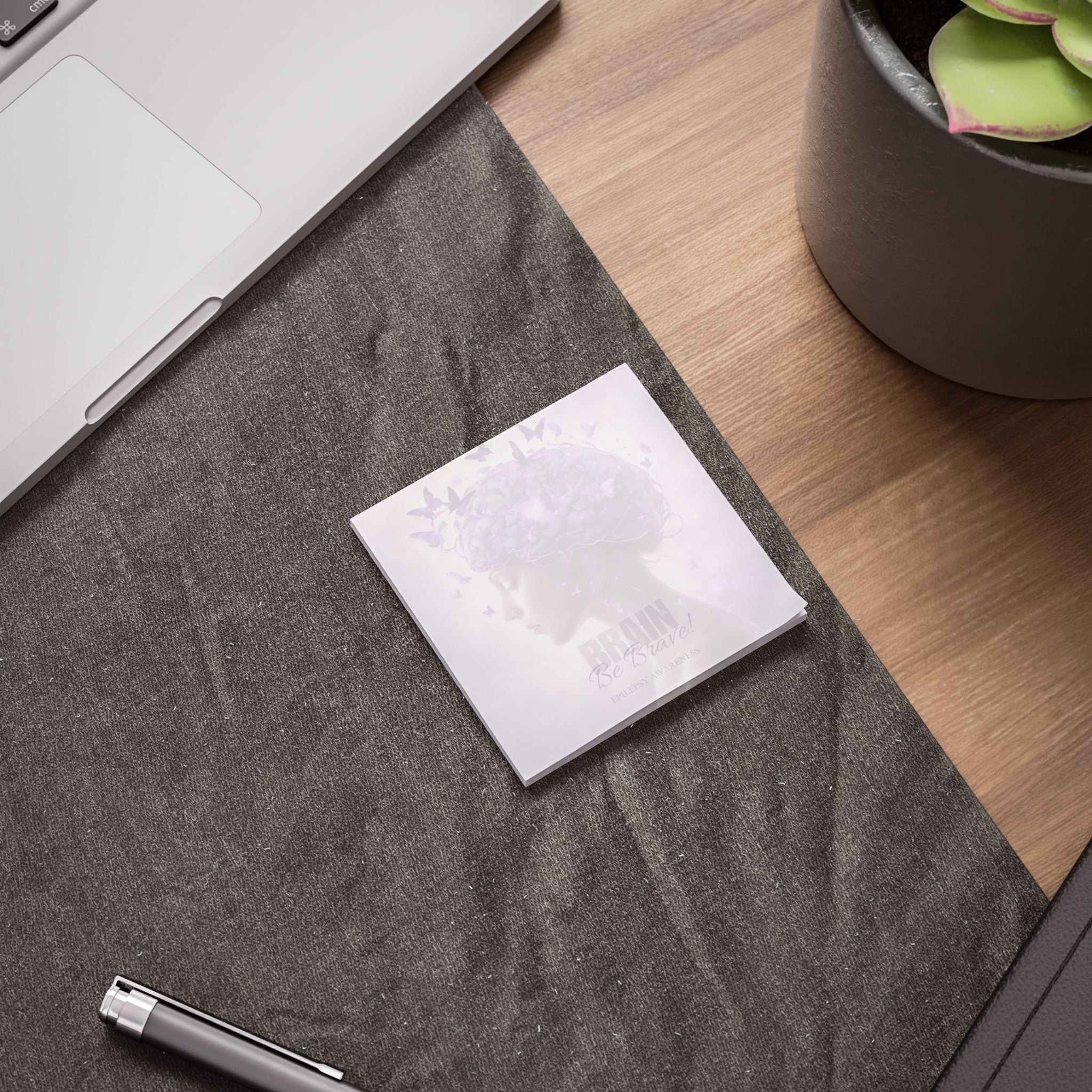 Photo depicting the ​Beautiful Brain Epilepsy Awareness Post-it® Note Pads from EpiAl's Shop.