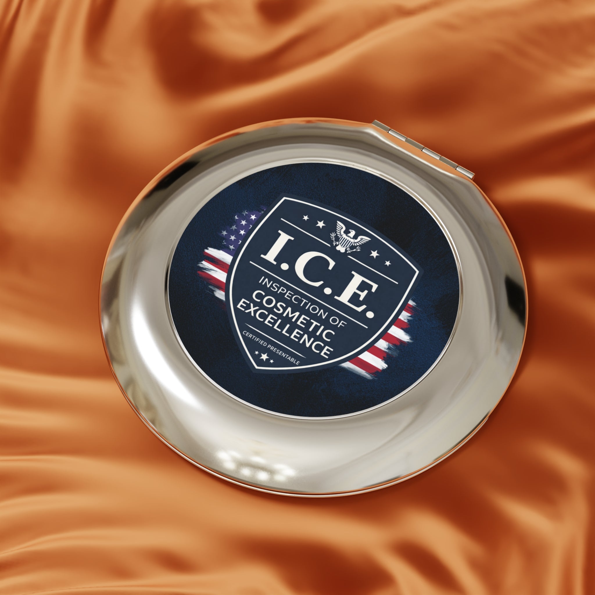 I.C.E. Parody Compact Mirror | Inspection of Cosmetic Excellence