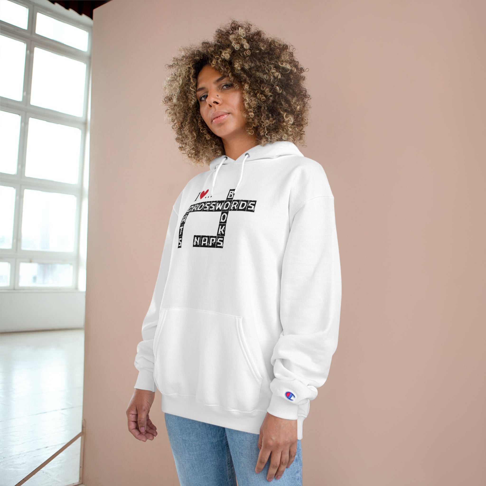Photo depicting the ​Crosswords and Cats Champion Hoodie from EpiAl's Shop.