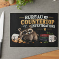 Bureau of Countertop Investigations Glass Cutting Board | Jimothy Raccoon Kitchen Decor