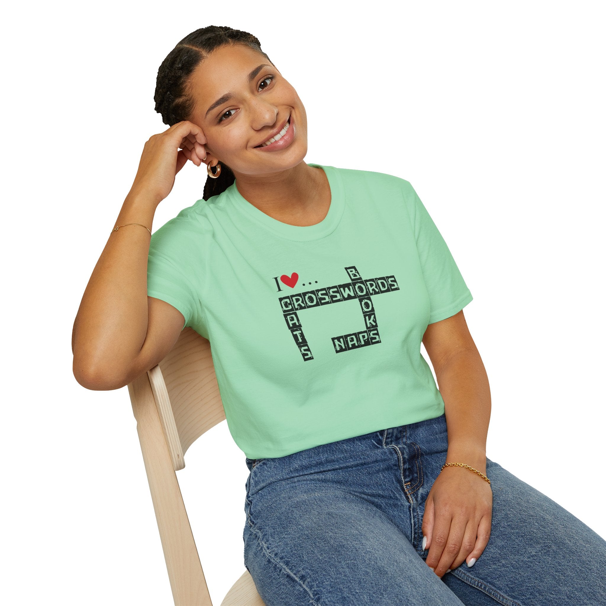 Photo depicting the ​Crosswords and Cats Unisex Softstyle T-Shirt from EpiAl's Shop.
