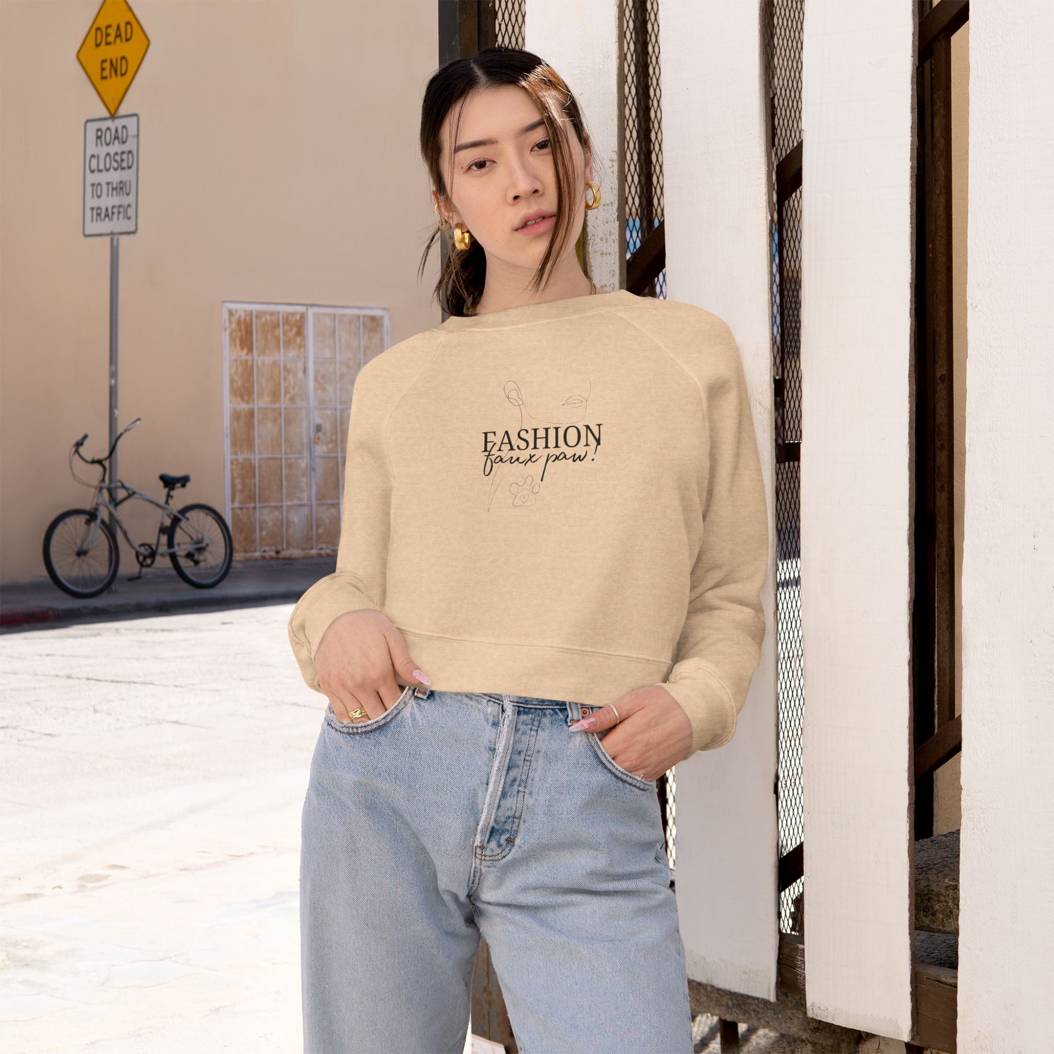 Photo depicting the ​Fashion Faux Paw Women's Cropped Fleece Pullover from EpiAl's Shop.