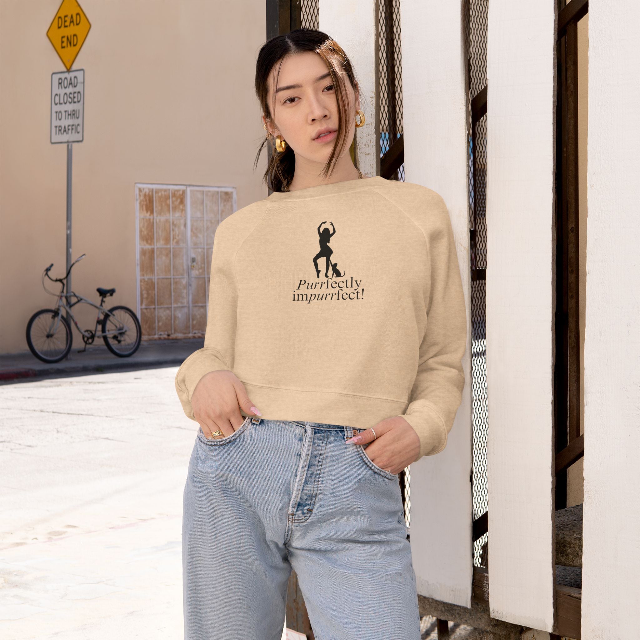 Photo depicting the ​Purrfectly Impurrfect Women's Cropped Fleece Pullover from EpiAl's Shop.