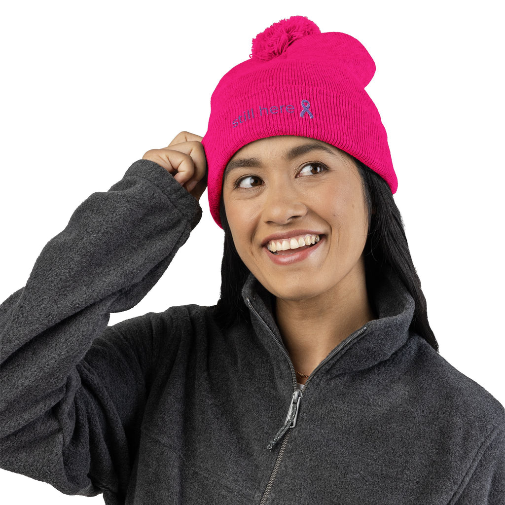 Still Here Pom-Pom Beanie – Epilepsy Awareness Knit Hat with Purple Ribbon