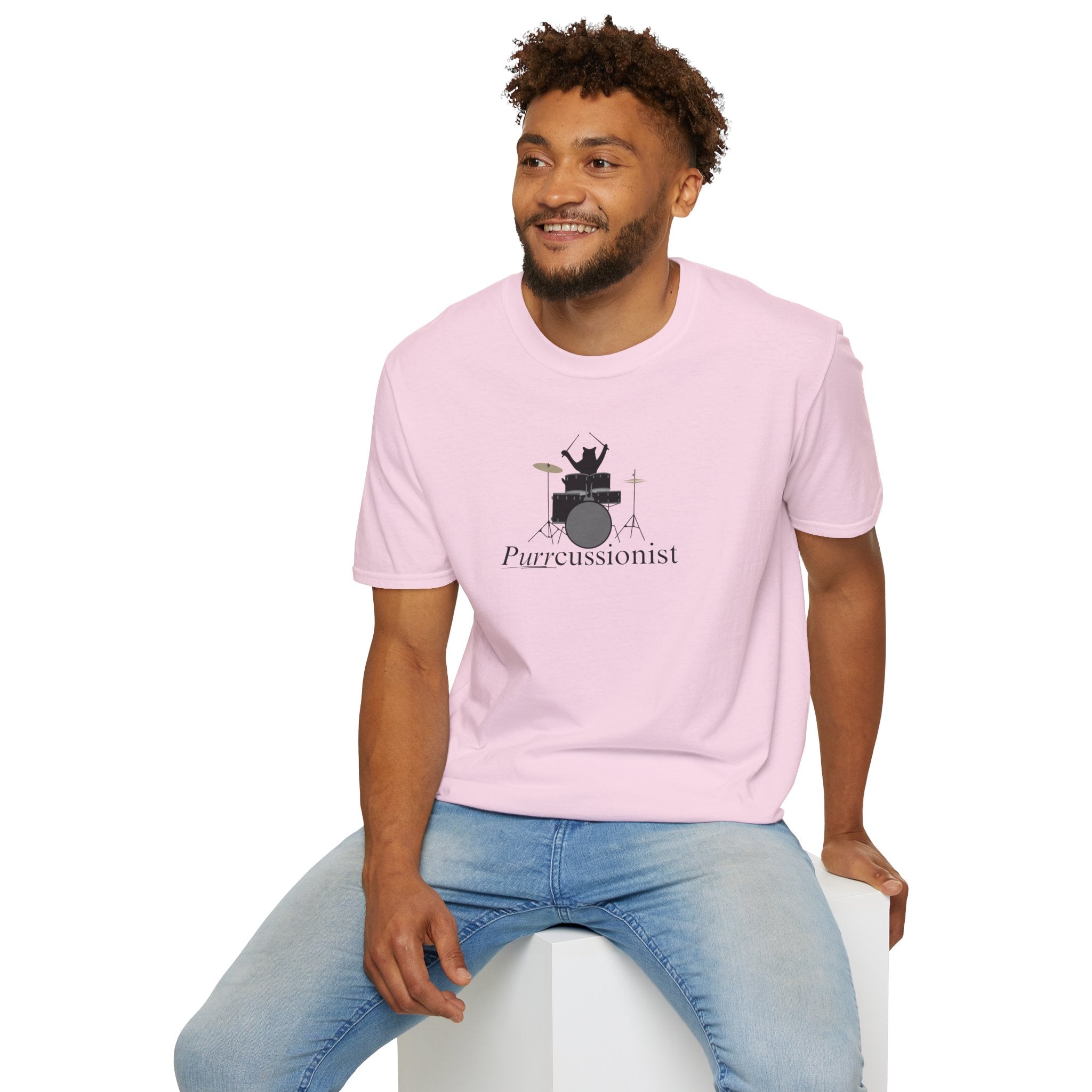 Photo depicting the ​Purrcussionist Unisex Softstyle T-Shirt from EpiAl's Shop.