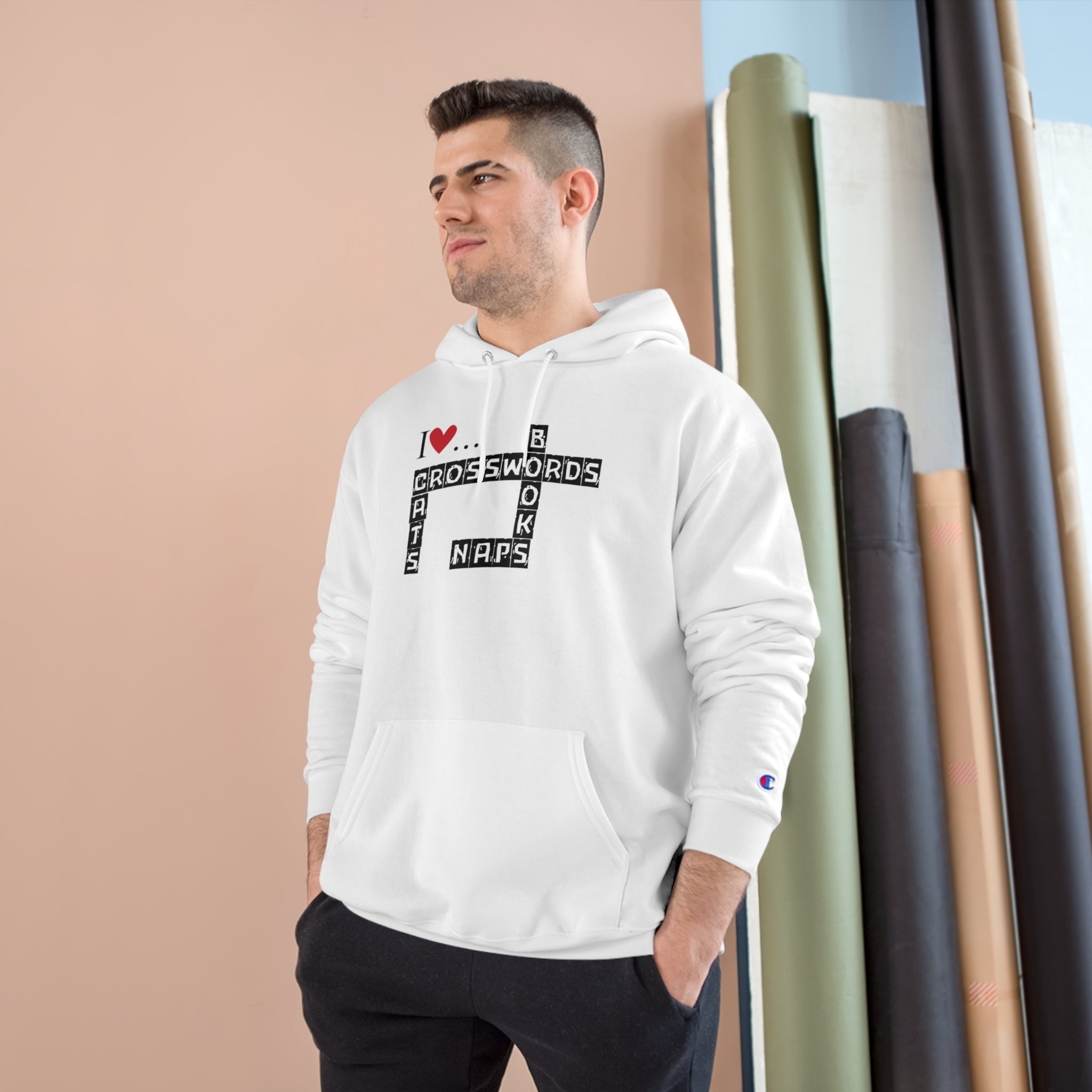 Photo depicting the ​Crosswords and Cats Champion Hoodie from EpiAl's Shop.