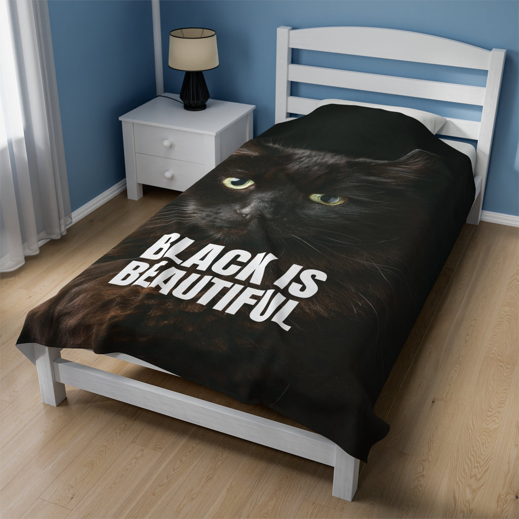 Photo depicting the ​Black is Beautiful Velveteen Plush Blanket from EpiAl's Shop.