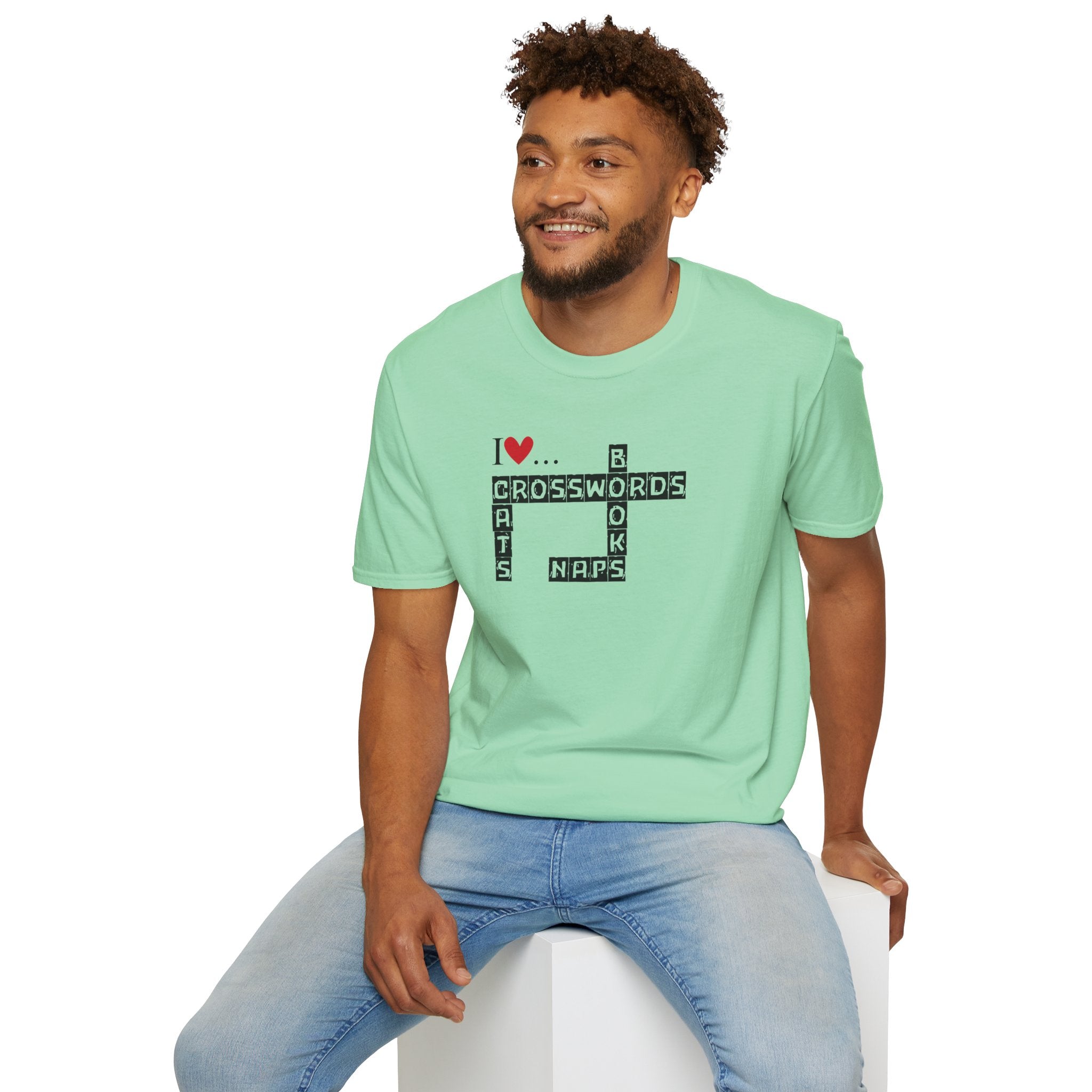 Photo depicting the ​Crosswords and Cats Unisex Softstyle T-Shirt from EpiAl's Shop.
