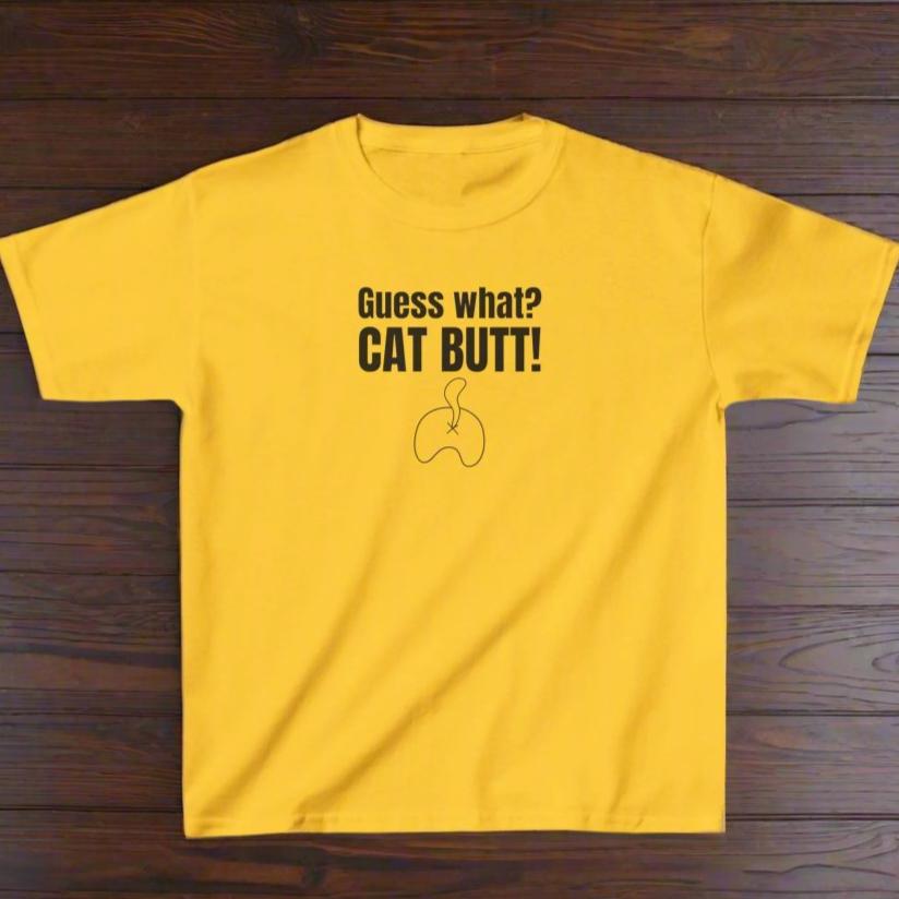 Photo depicting the ​Guess What? Cat Butt! Kids Heavy Cotton™ Tee from EpiAl's Shop.
