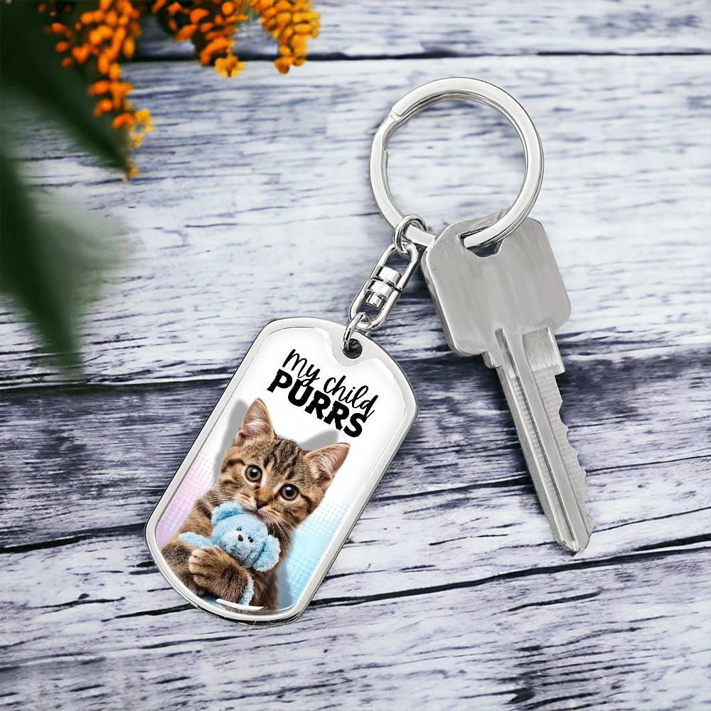 Photo depicting the ​My Child Purrs Keychain from EpiAl's Shop.