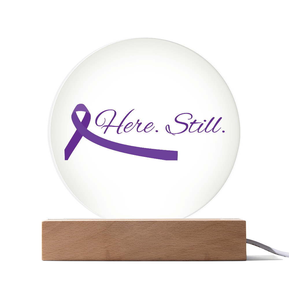 “Here. Still.” Acrylic Circle Plaque with Purple Ribbon — LED Light Base Included