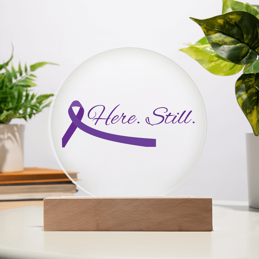 “Here. Still.” Acrylic Circle Plaque with Purple Ribbon — LED Light Base Included