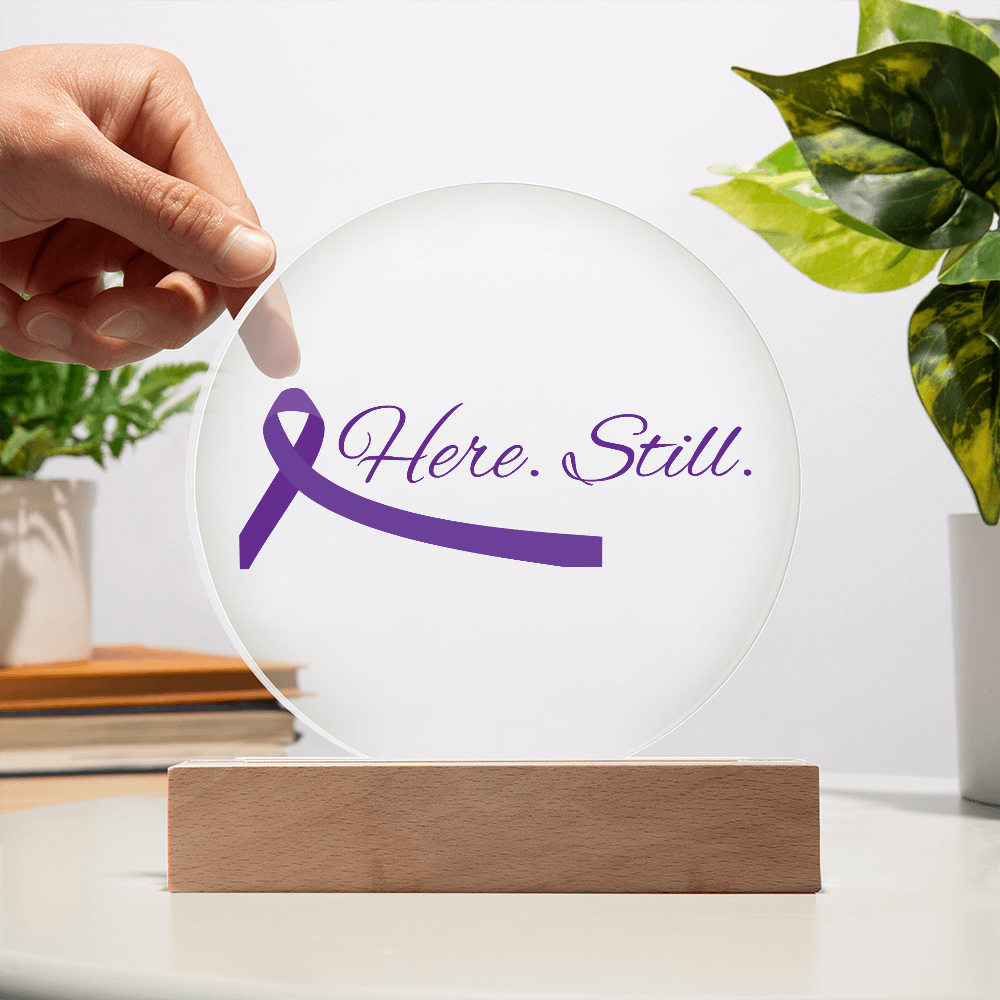 “Here. Still.” Acrylic Circle Plaque with Purple Ribbon — LED Light Base Included