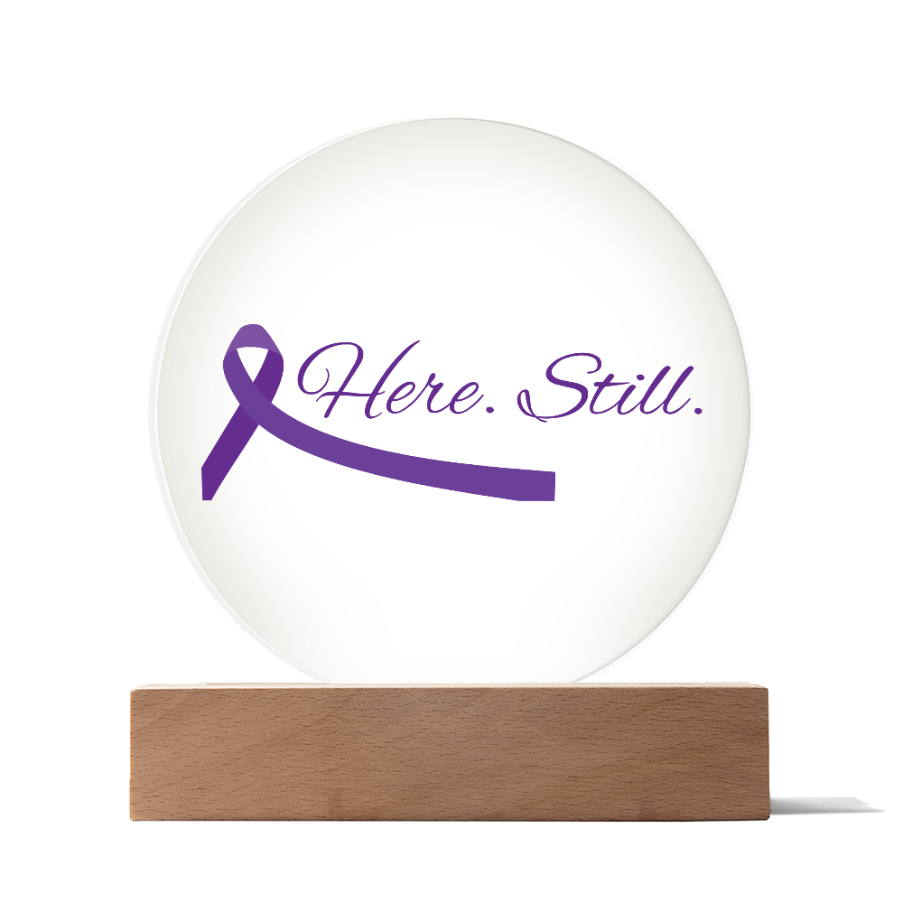 “Here. Still.” Acrylic Circle Plaque with Purple Ribbon — LED Light Base Included